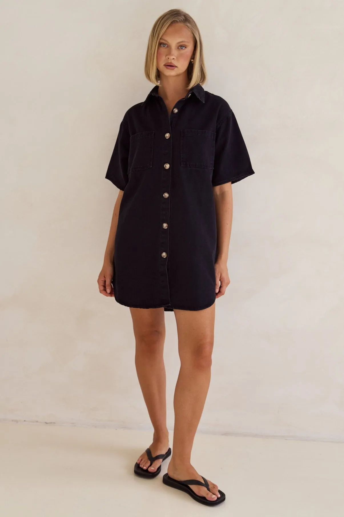 Andie Denim Mini Dress (Black) sold by Runway Scout