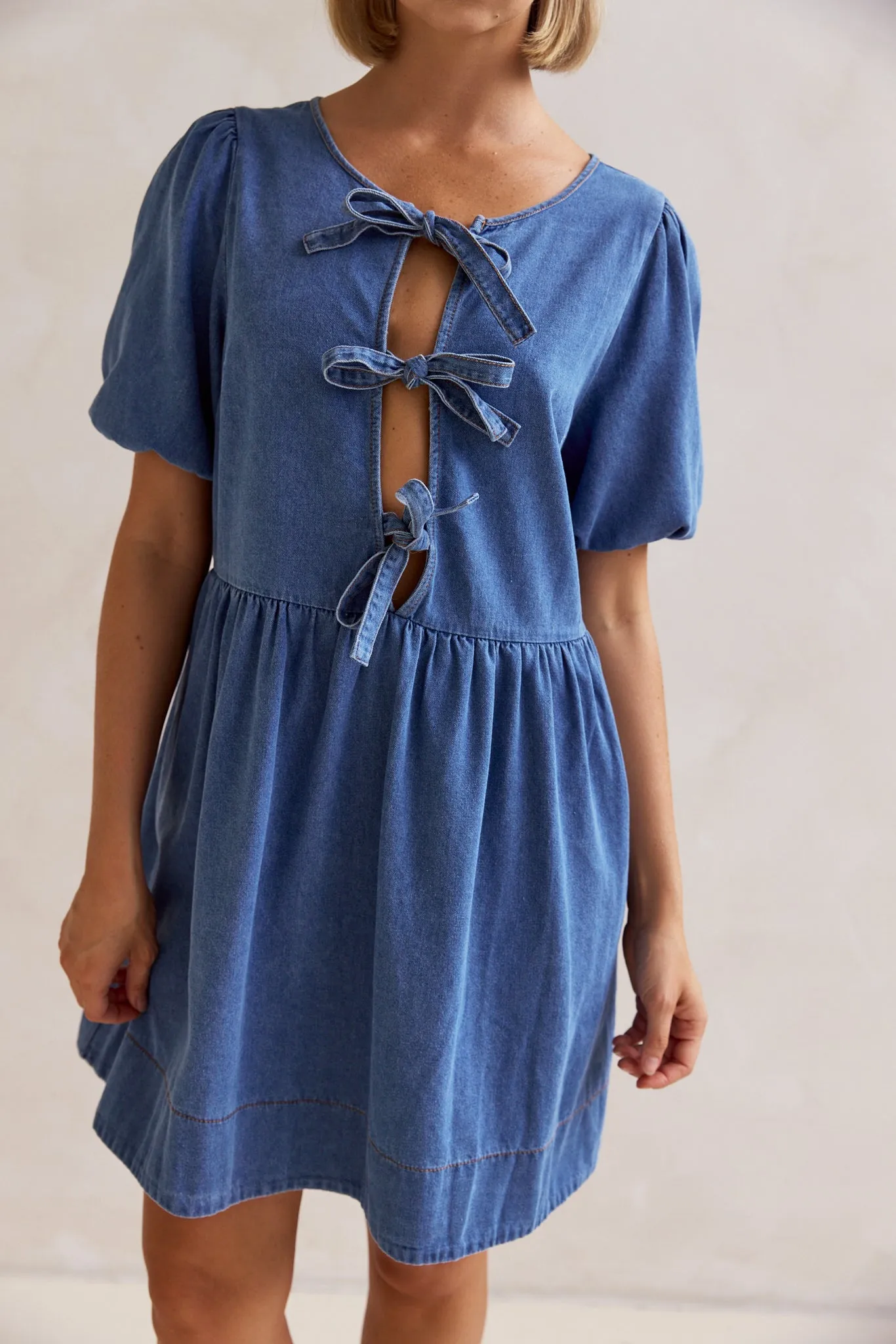 Carmela Denim Mini Dress (Blue) sold by Runway Scout