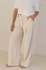 Odette Pant (Beige) sold by Runway Scout