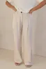 Odette Pant (Beige) sold by Runway Scout