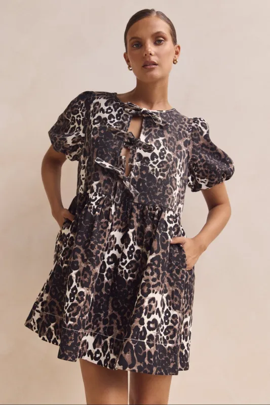 Carmela Denim Mini Dress (Leopard) sold by Runway Scout
