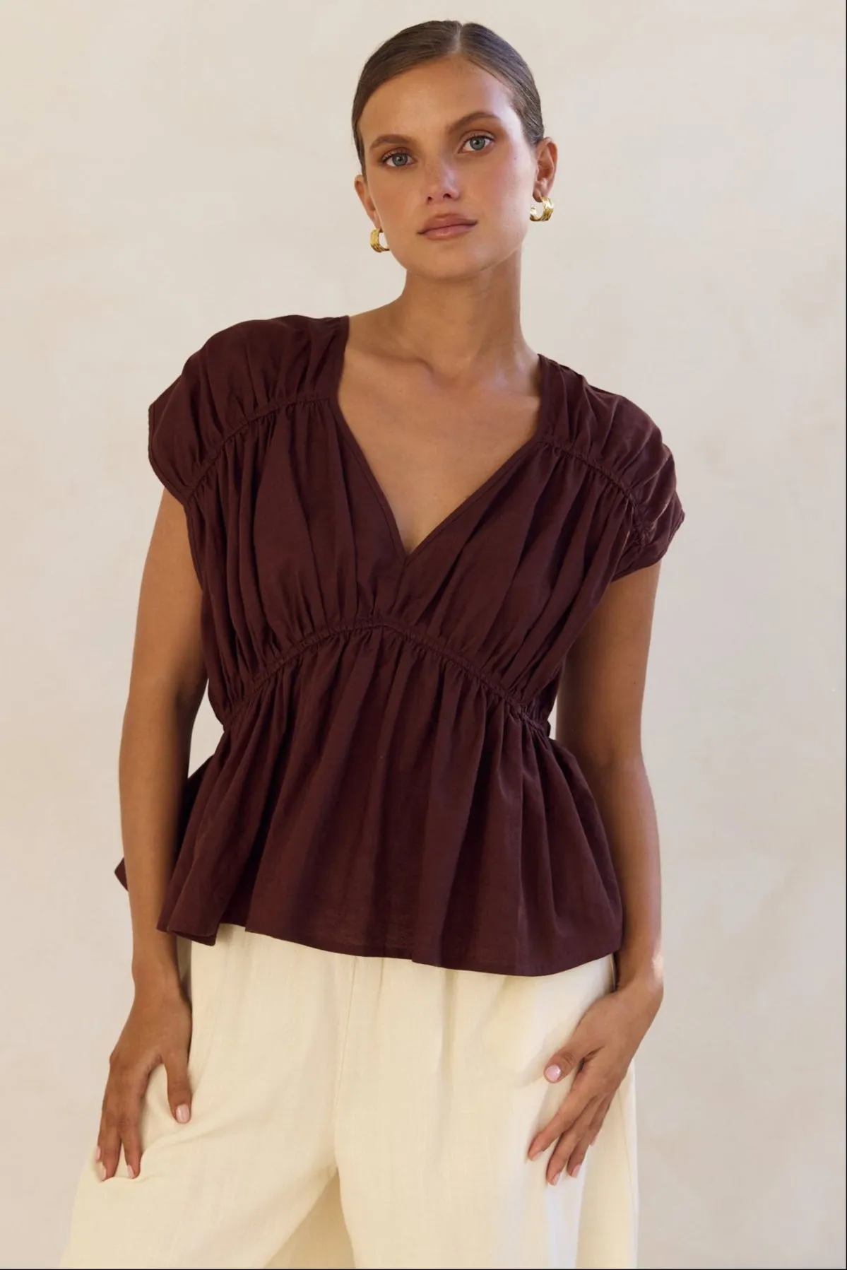 Benita Top (Chocolate) sold by Runway Scout