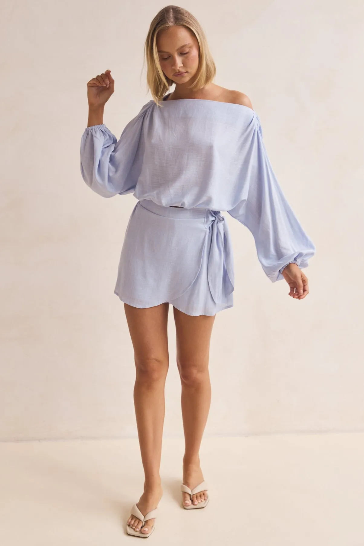 Myra Top (Blue) sold by Runway Scout