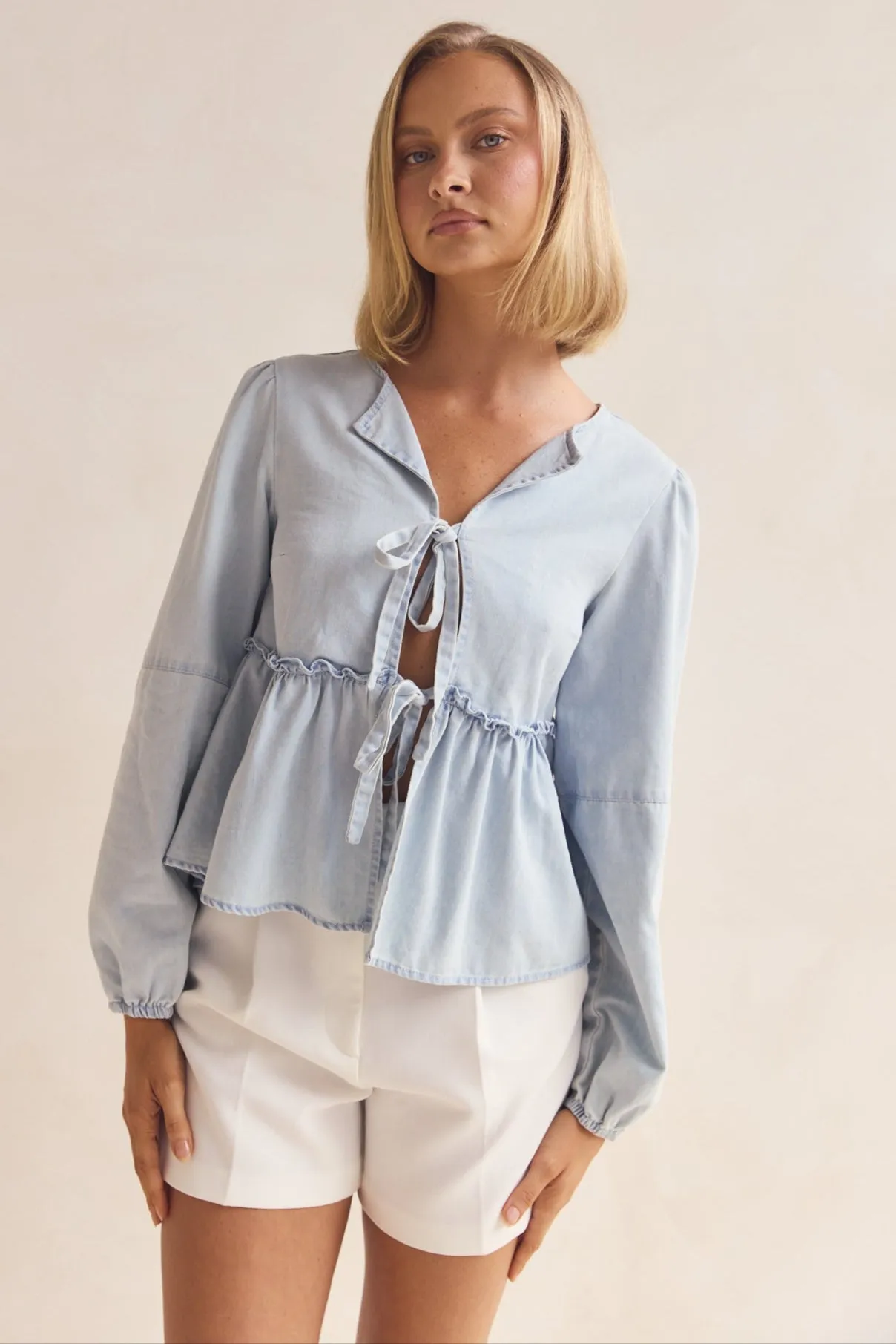 Lina Top (Blue) sold by Runway Scout