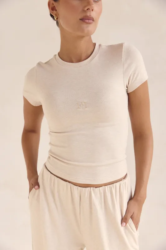 Harlem Tee (Beige) sold by Runway Scout