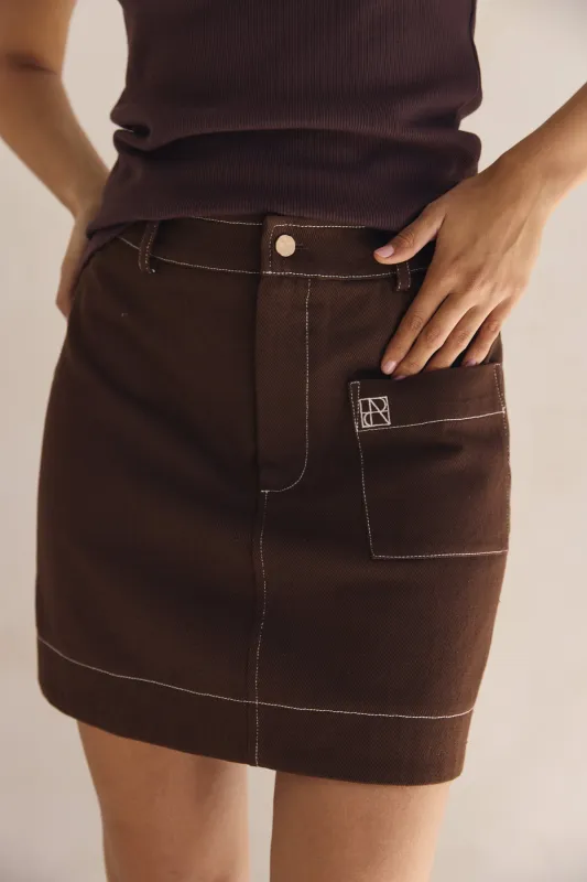 Dakoda Denim Mini Skirt (Chocolate) sold by Runway Scout