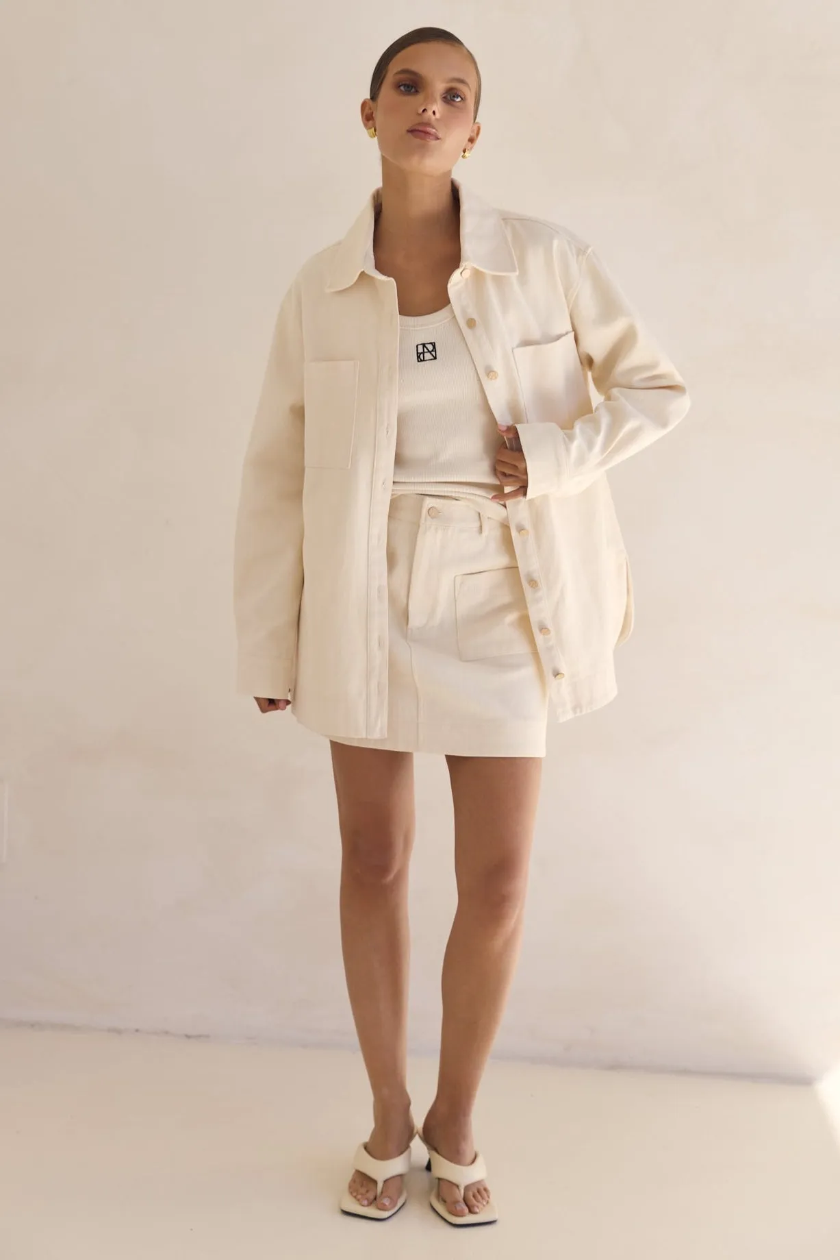 Dakoda Denim Mini Skirt (Cream) sold by Runway Scout product image thumbnail 3