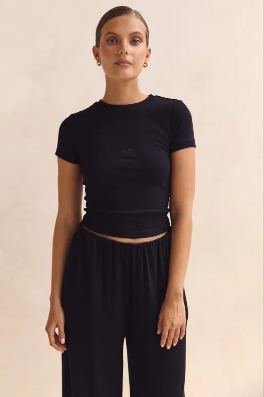 Harlem Tee (Black) sold by Runway Scout