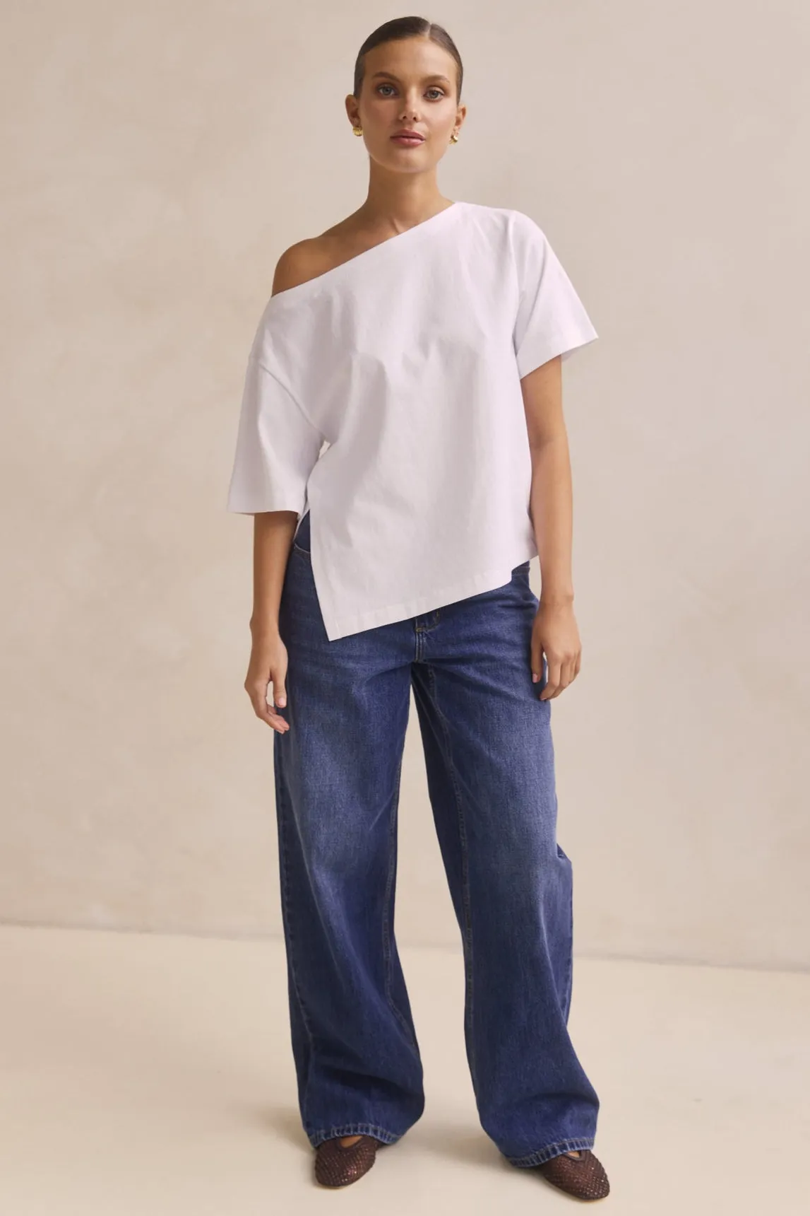 Genevieve Asym Tee (White) sold by Runway Scout