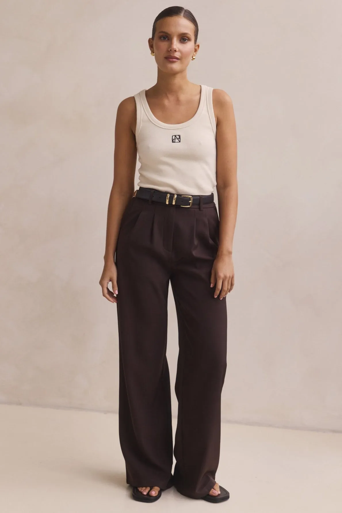 Dahlia Pant (Dark Brown) sold by Runway Scout