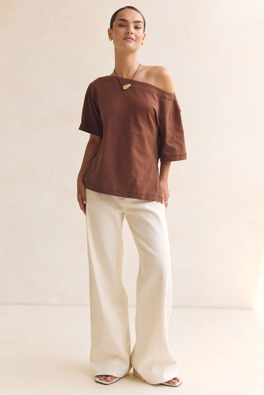 Genevieve Asym Top (Chocolate) sold by Runway Scout