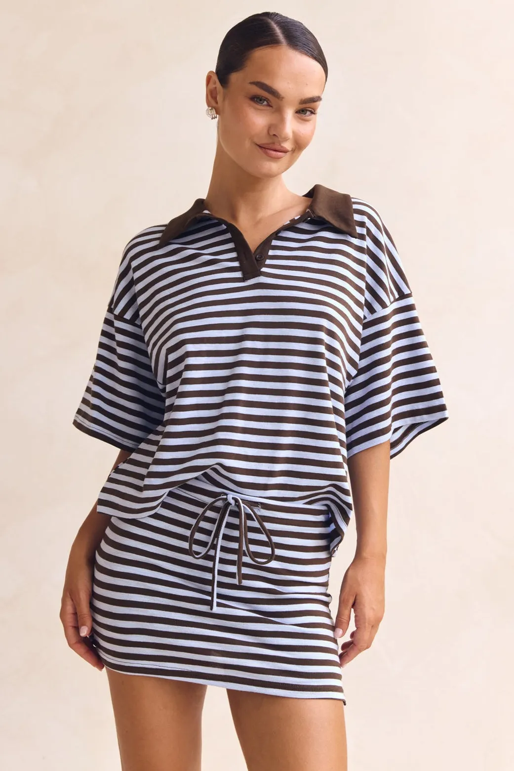 Sawyer Mini Skort (Chocolate) sold by Runway Scout