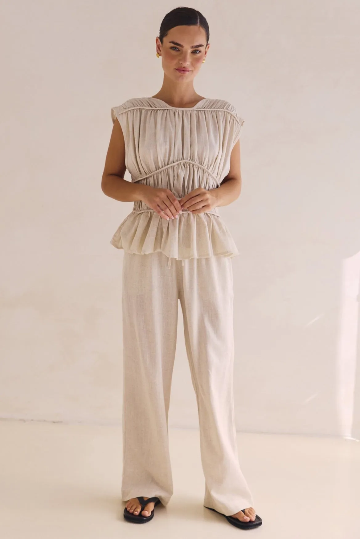 Emilia Pant (Beige) sold by Runway Scout