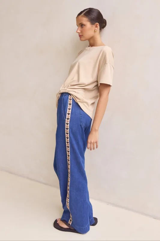 Elara Denim Pant (Blue) sold by Runway Scout