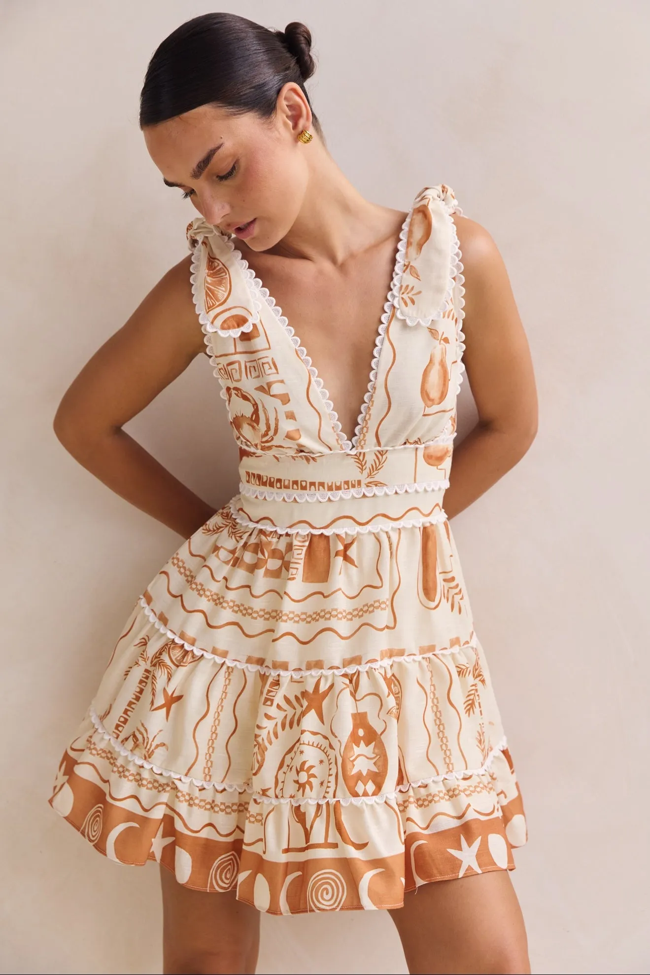 Lindsay Mini Dress (Cream) sold by Runway Scout