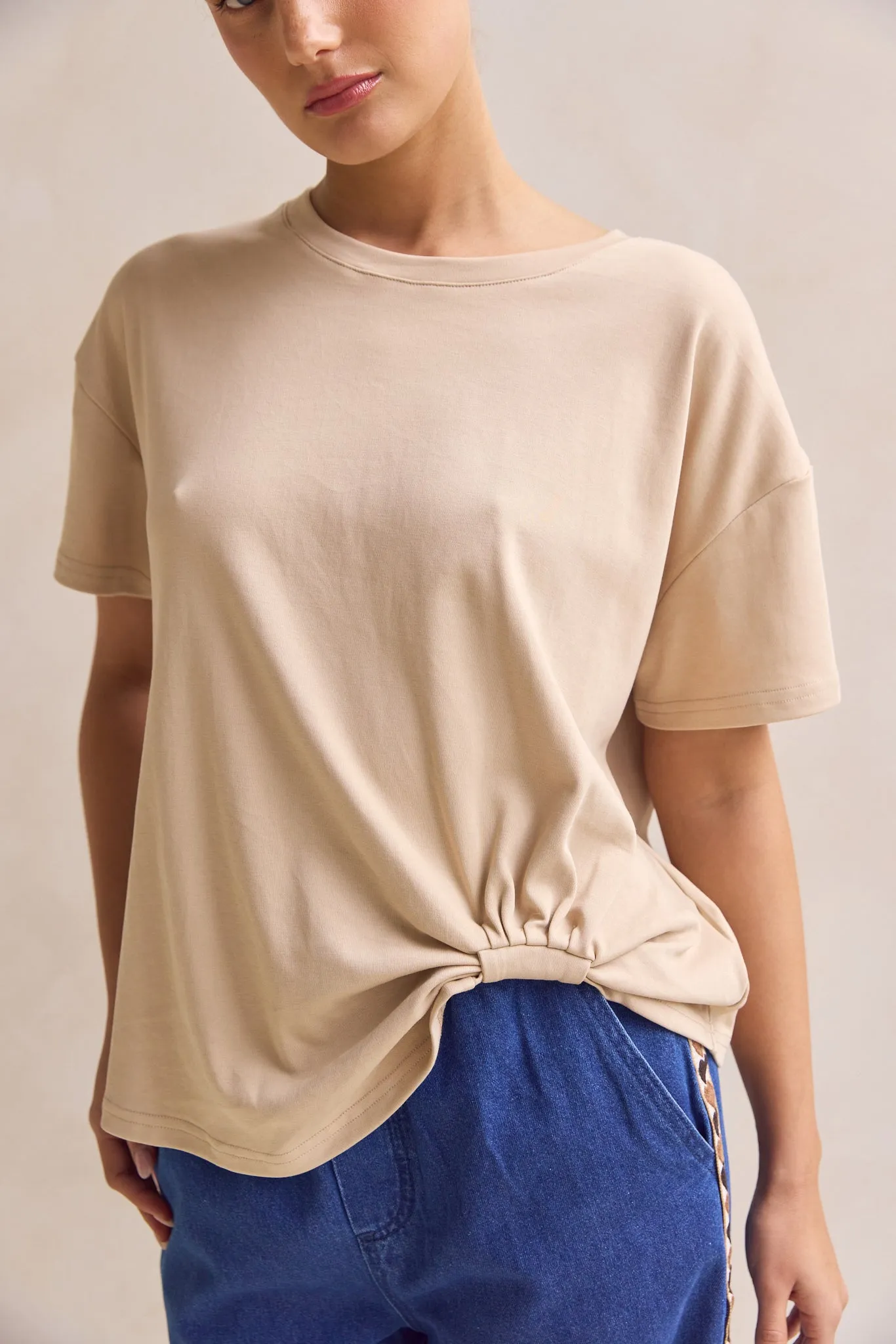 Nina Tee (Sand) sold by Runway Scout