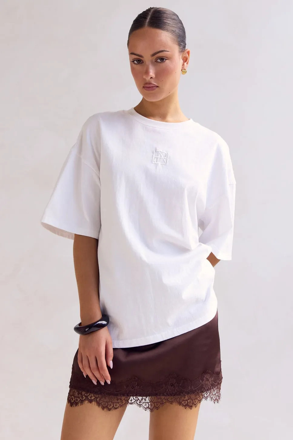 Aster Lace Mini Skirt (Chocolate) sold by Runway Scout product image thumbnail 3