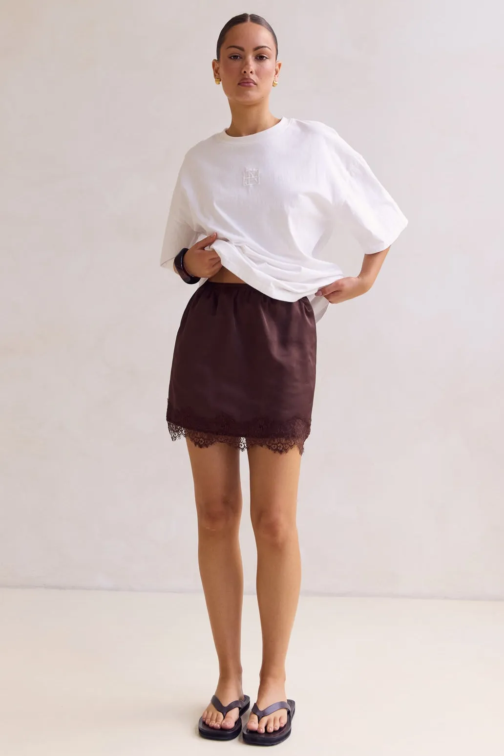 Aster Lace Mini Skirt (Chocolate) sold by Runway Scout product image thumbnail 5