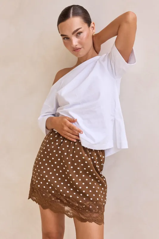 Jada Polka Mini Skirt (Brown) sold by Runway Scout
