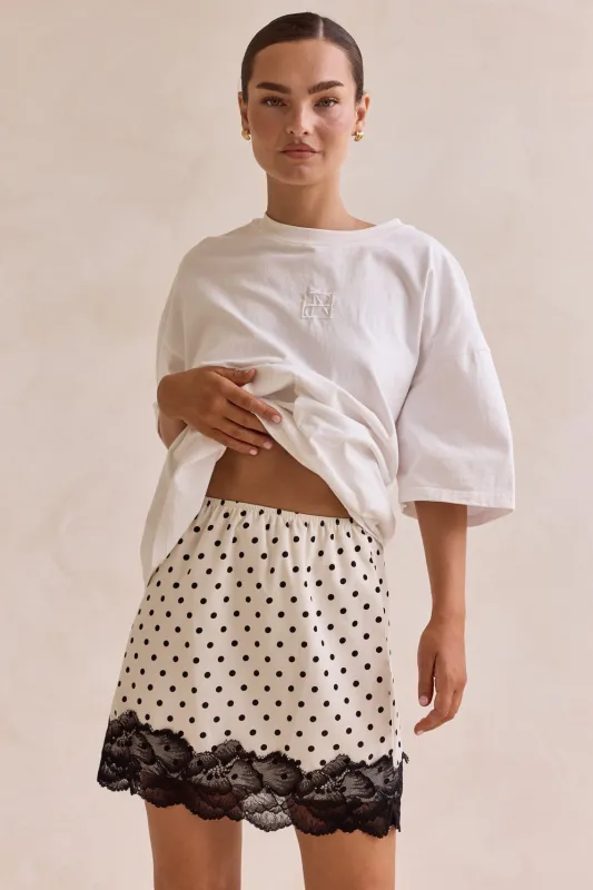 Jada Polka Mini Skirt (Cream) sold by Runway Scout