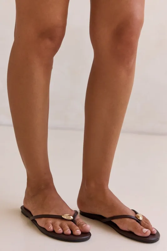 Freezia Sandals (Chocolate) sold by Runway Scout