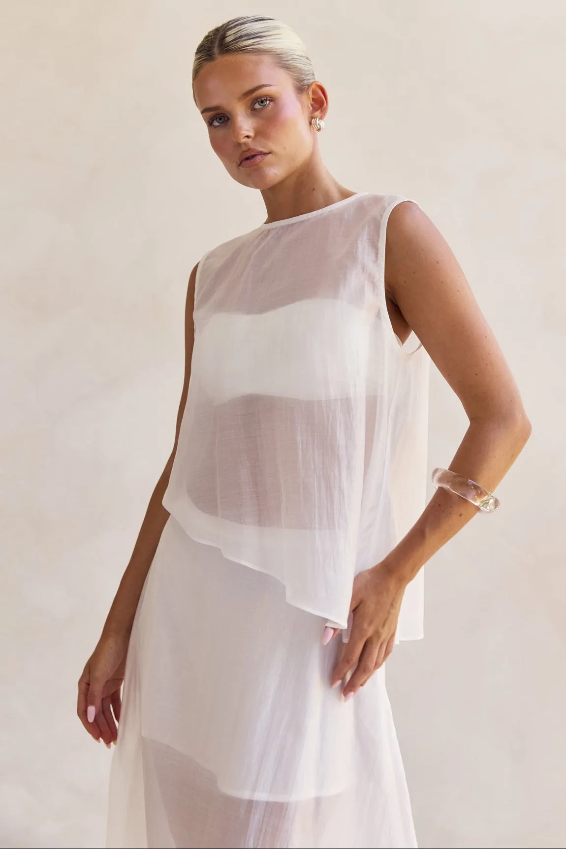 Lena Asym Top (White) sold by Runway Scout