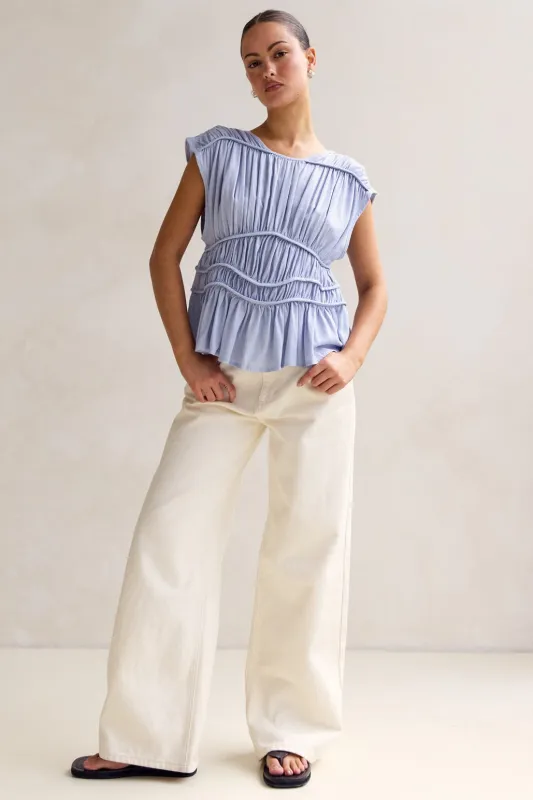 Emilia Top (Blue) sold by Runway Scout