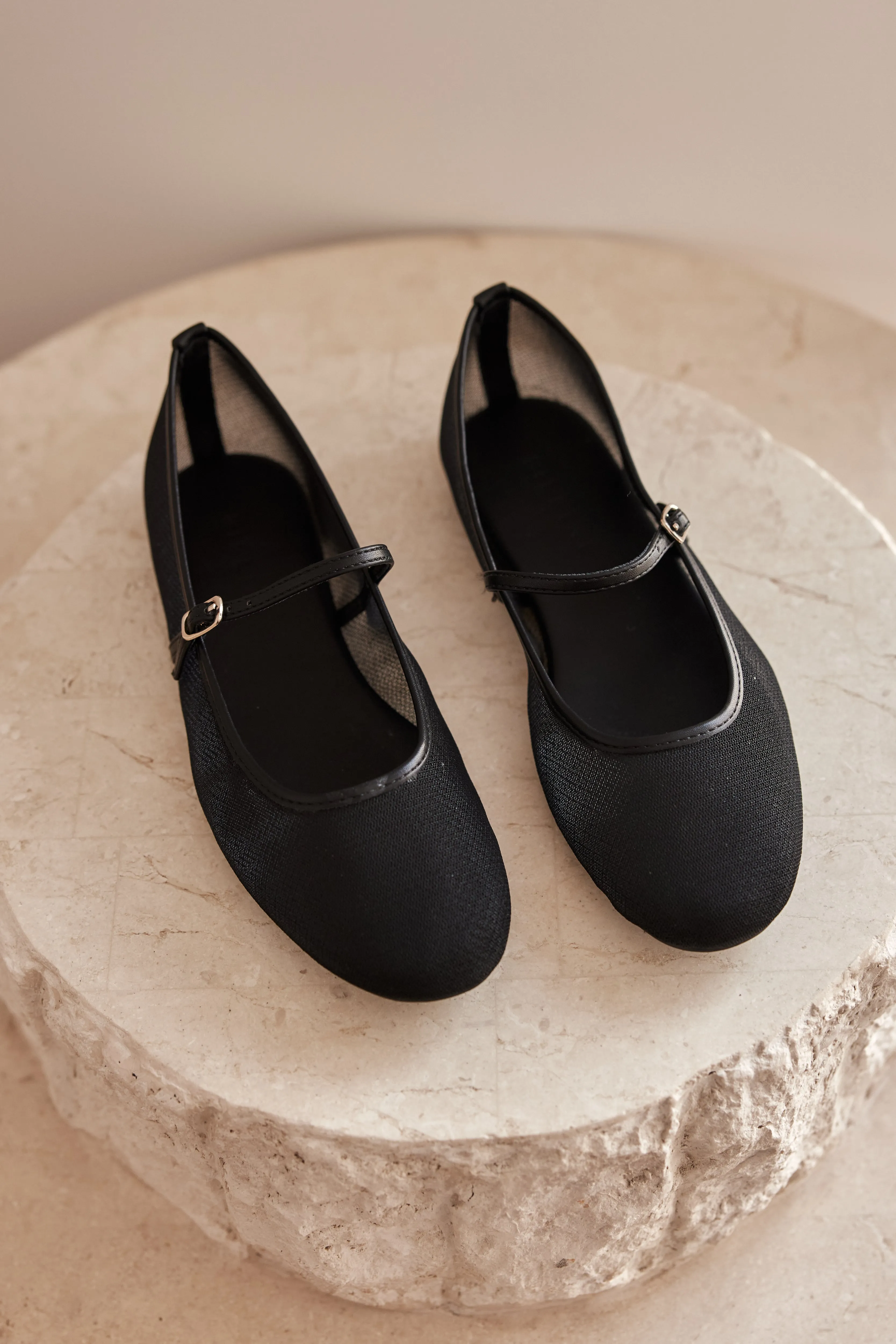 Gilda Flat (Black Mesh) sold by Runway Scout