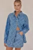 Courtney Denim Mini Skirt (Blue) sold by Runway Scout