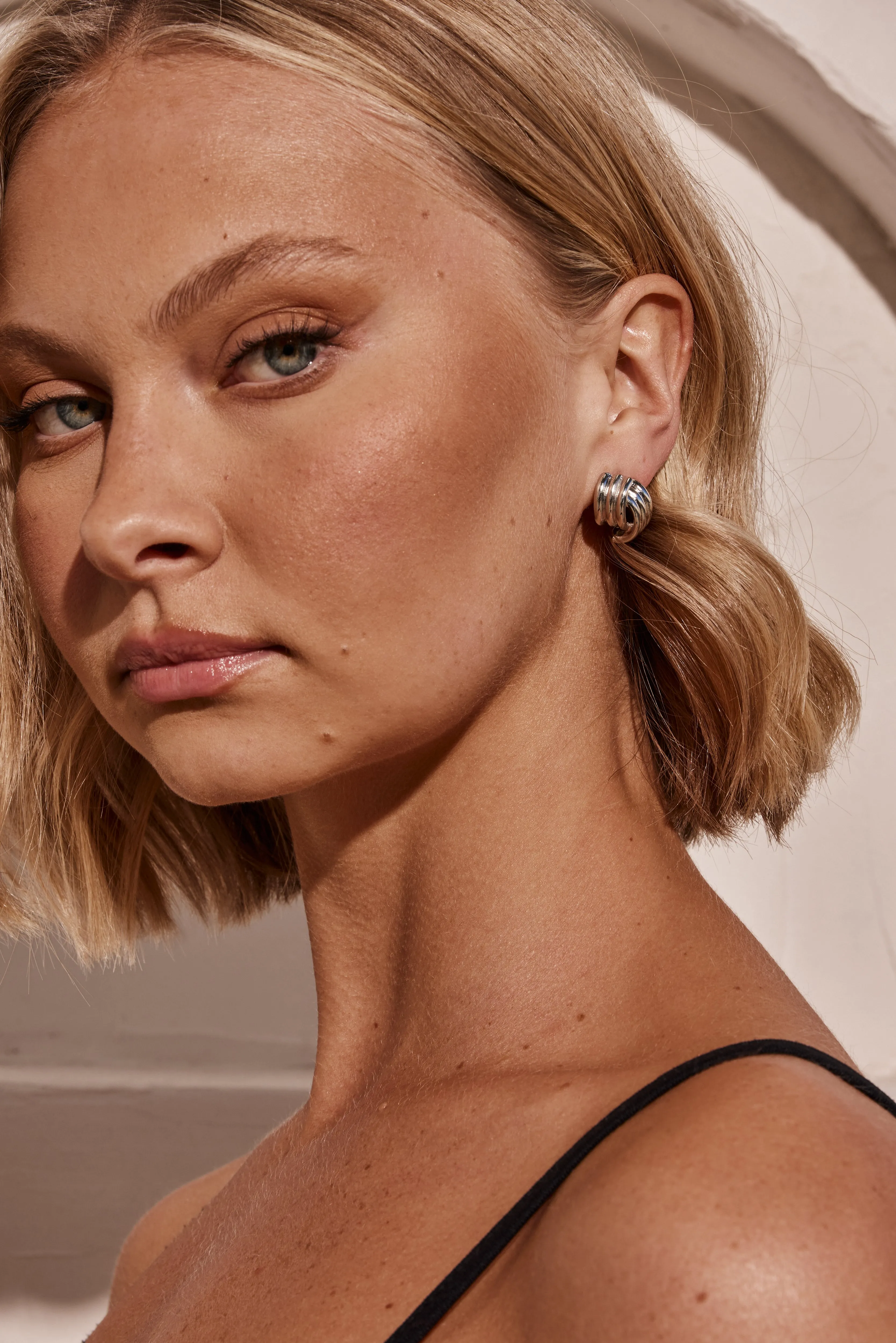 Bellan Earrings (Silver) sold by Runway Scout