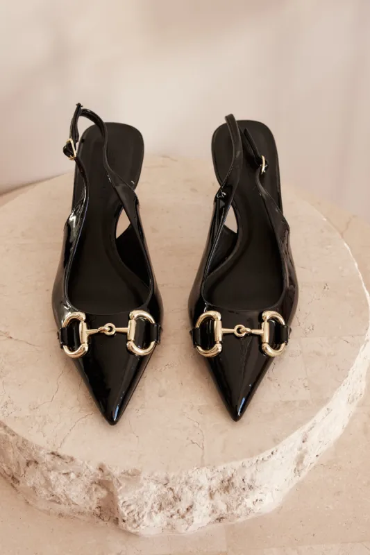 Abbie Heels (Black) sold by Runway Scout