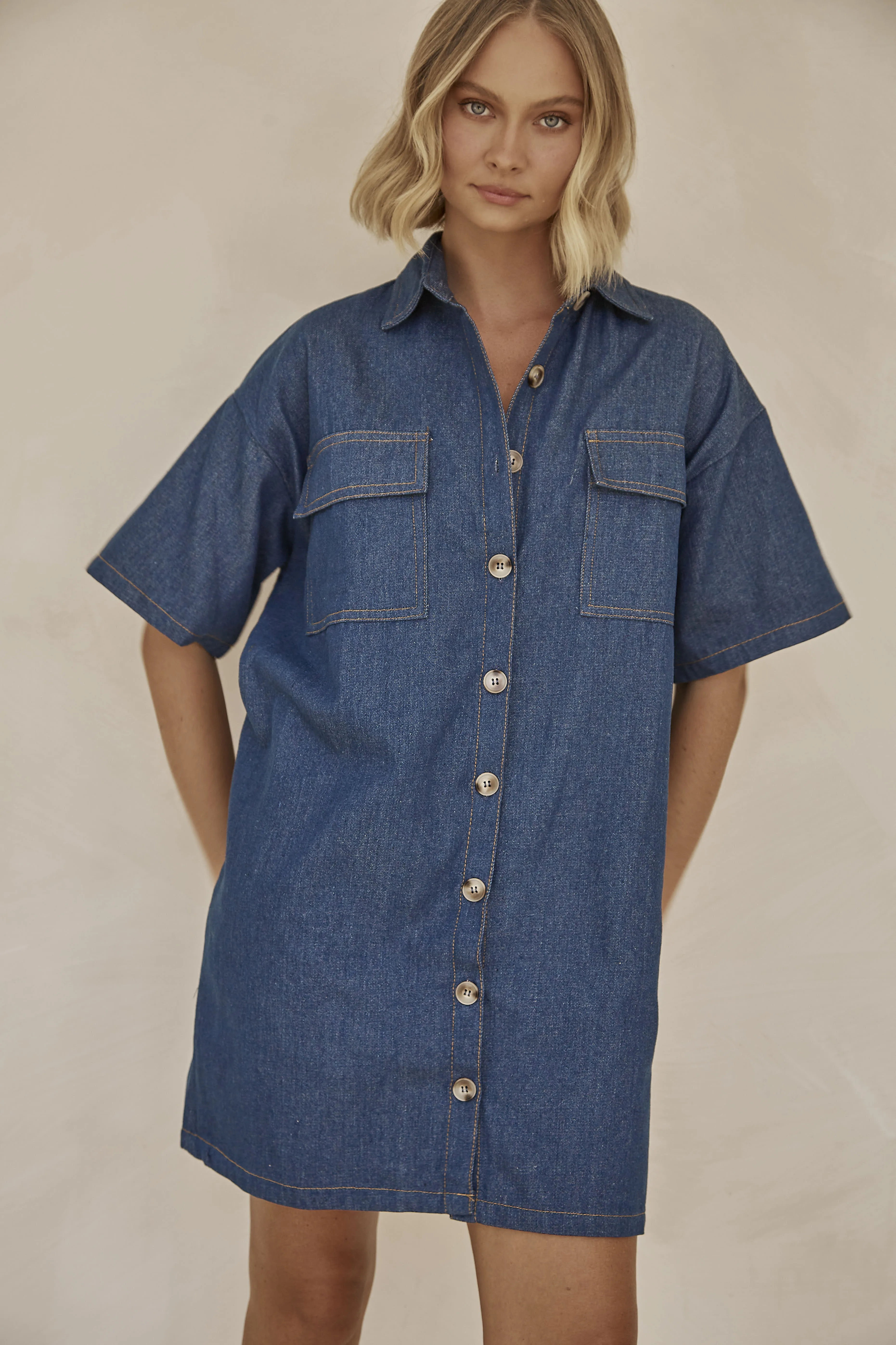 Emmi Denim Mini Dress (Blue) sold by Runway Scout