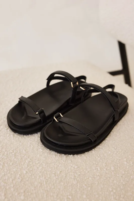 Tasa Sandals (Black) sold by Runway Scout