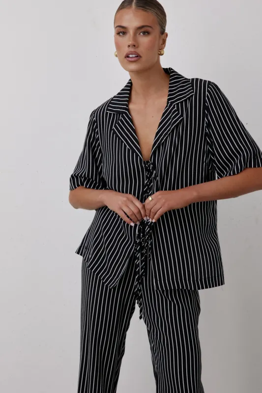 Veda Shirt (Black) sold by Runway Scout