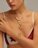 Gold Starfish Necklace sold by En Route Jewelry