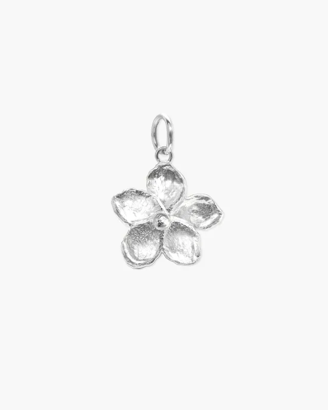 Textured Floral Pendant in Silver made by En Route Jewelry