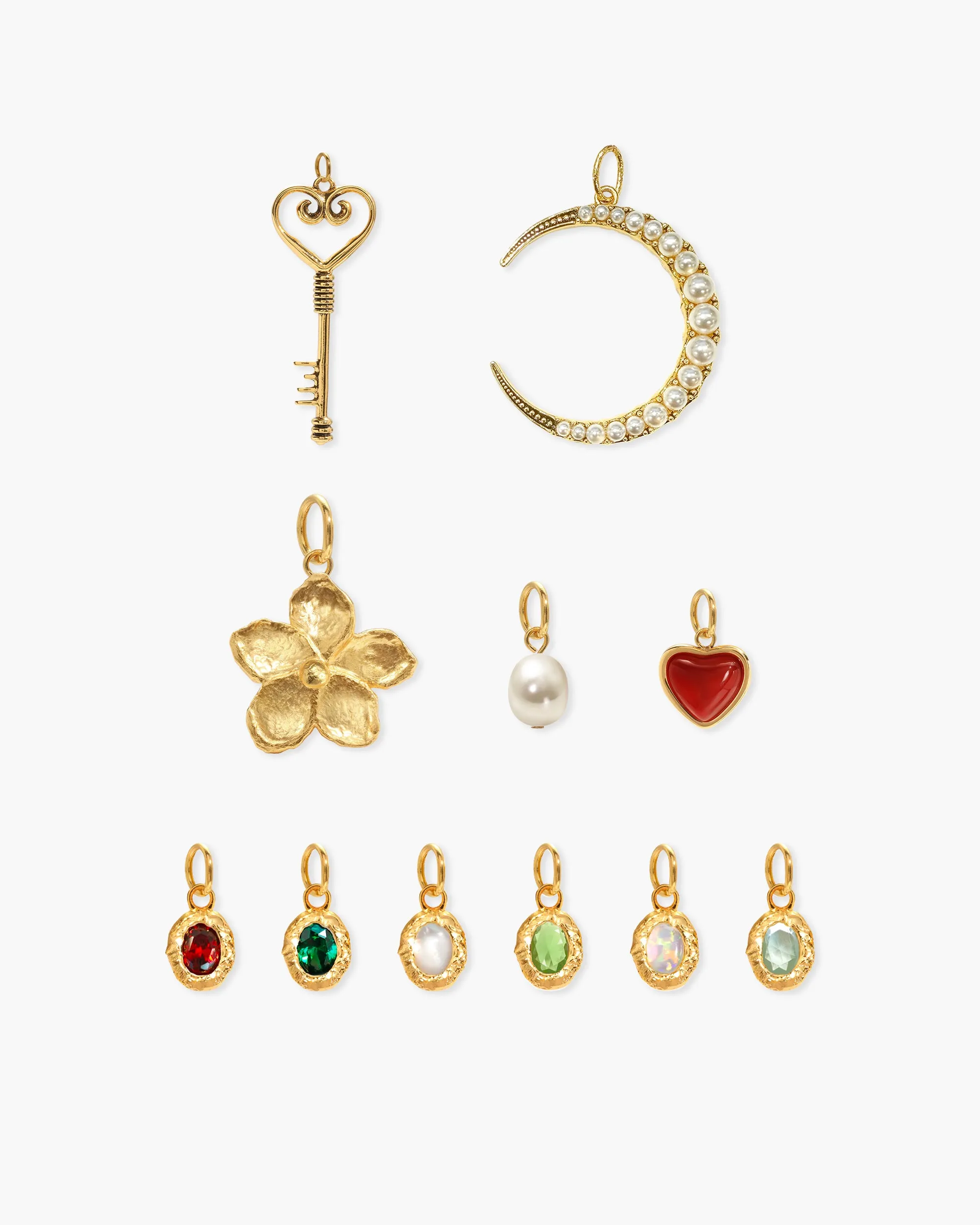 Tiny Meanings & Birthstone Charm in Gold sold by En Route Jewelry