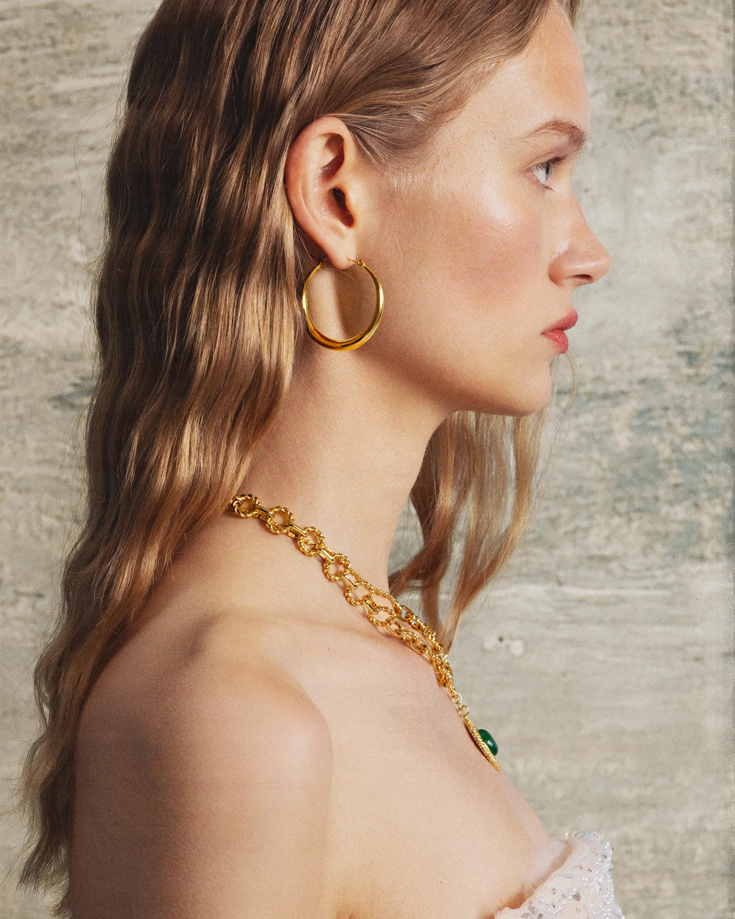 Sloane Hoop Earrings in Gold sold by en route product image thumbnail 4