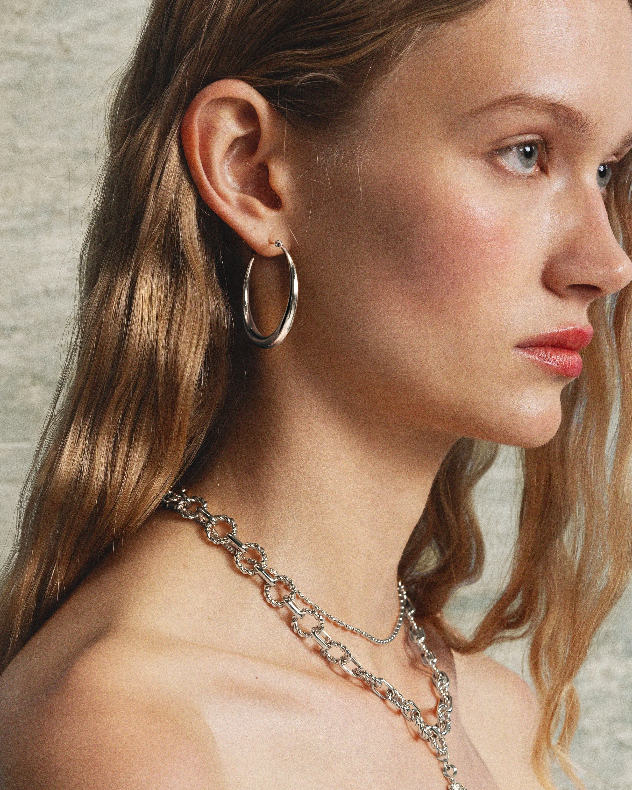 Sloane Hoop Earrings in Silver sold by en route product image thumbnail 2