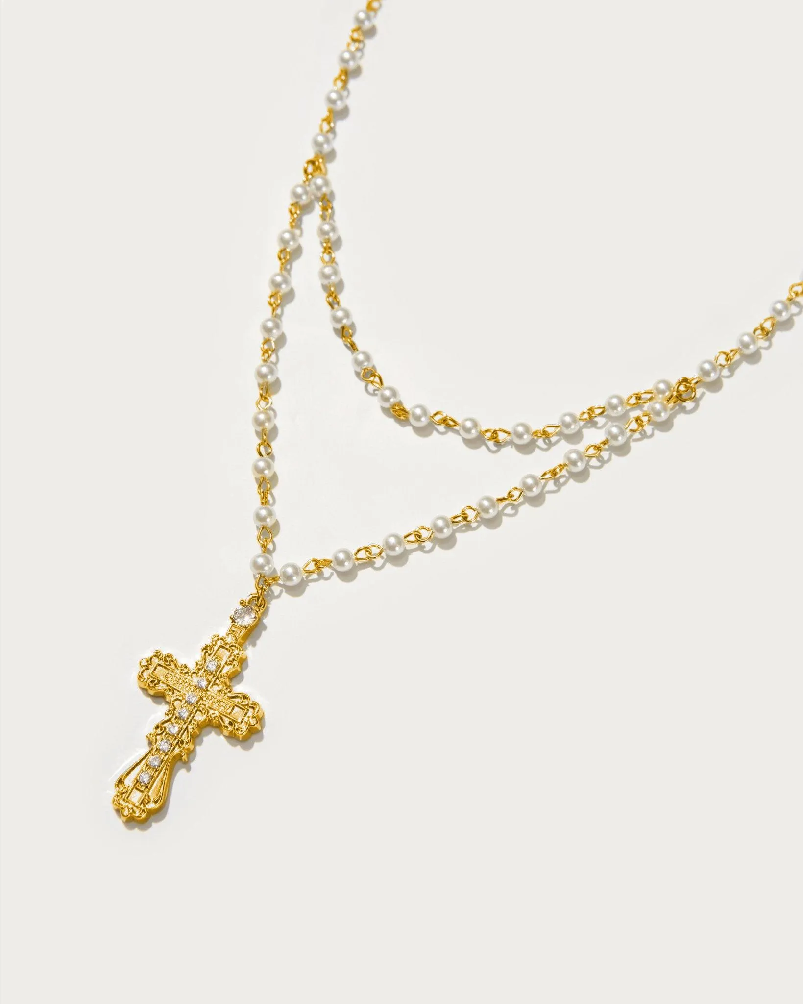 Everette Cross Necklace in Gold sold by En Route Jewelry product image thumbnail 3