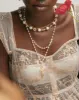 Everette Cross Necklace in Gold sold by En Route Jewelry