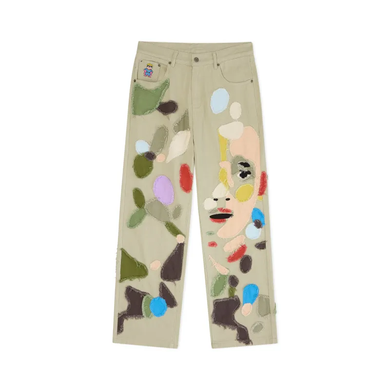 Allover Patchwork Face Pants [Multi] sold by KidSuper Studios
