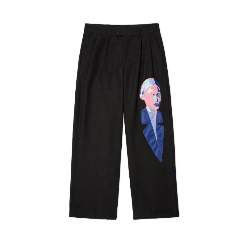 Patchwork Face Tweed Pants [Black] sold by KidSuper Studios