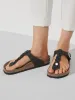 WOMENS BIRKENSTOCK GIZEH BRAIDED LEATHER REGULAR FIT SANDALS sold by Blackwell