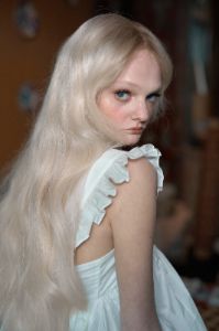 The Ivory Ruffle Apron Top sold by Selkie