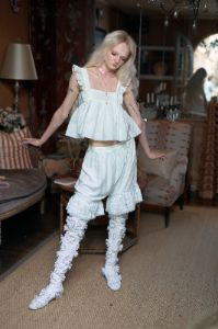 The Ivory Ruffle Apron Top sold by Selkie