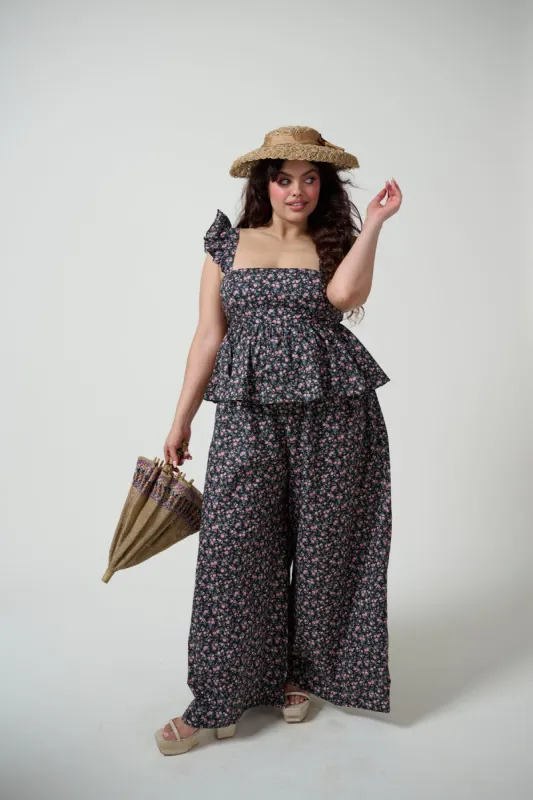 The Garden Song Weekender Jumpsuit sold by Selkie