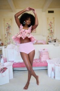 The Queen Bee Ruffle Apron Top sold by Selkie