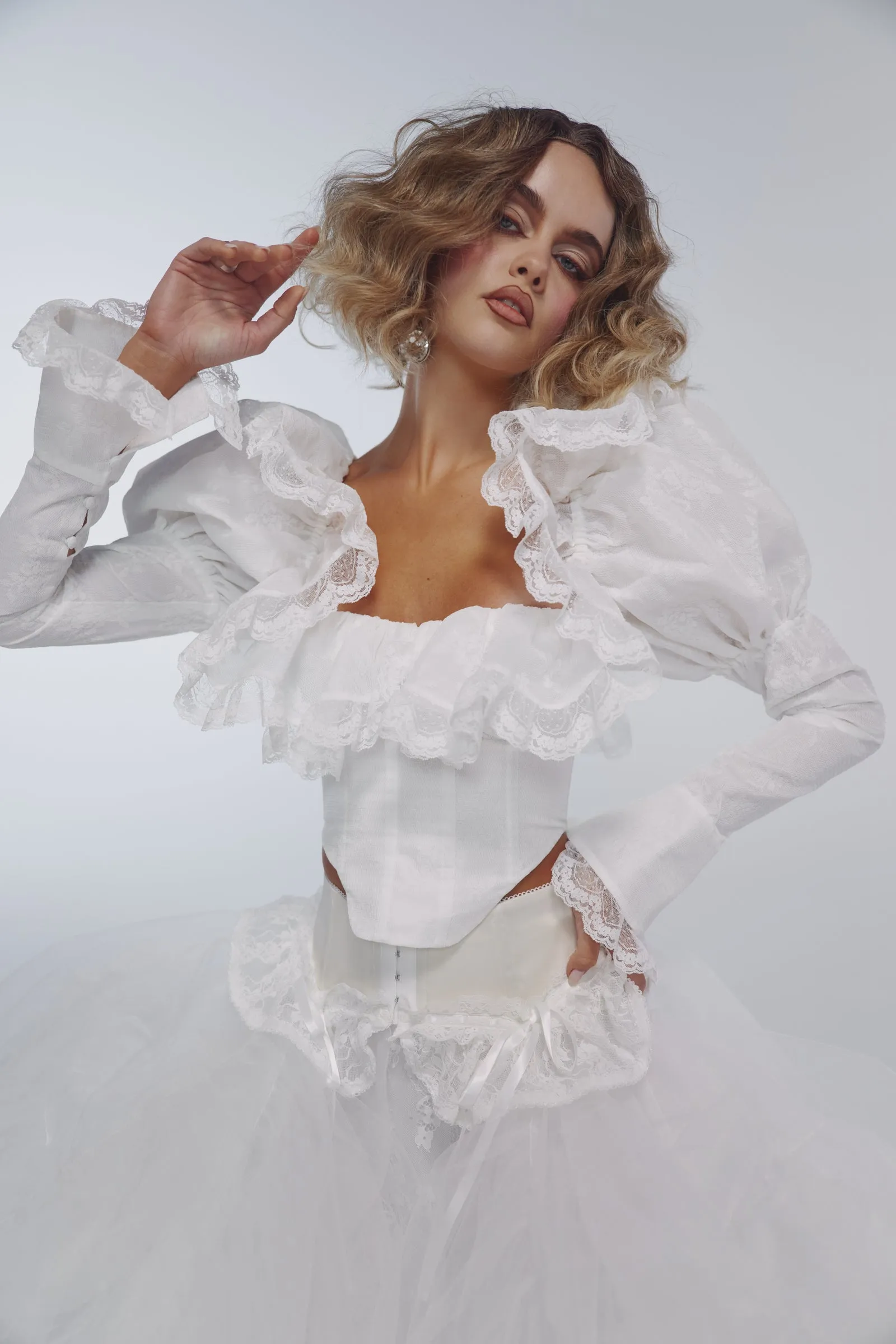 The Ivory Coquette Corset sold by Selkie