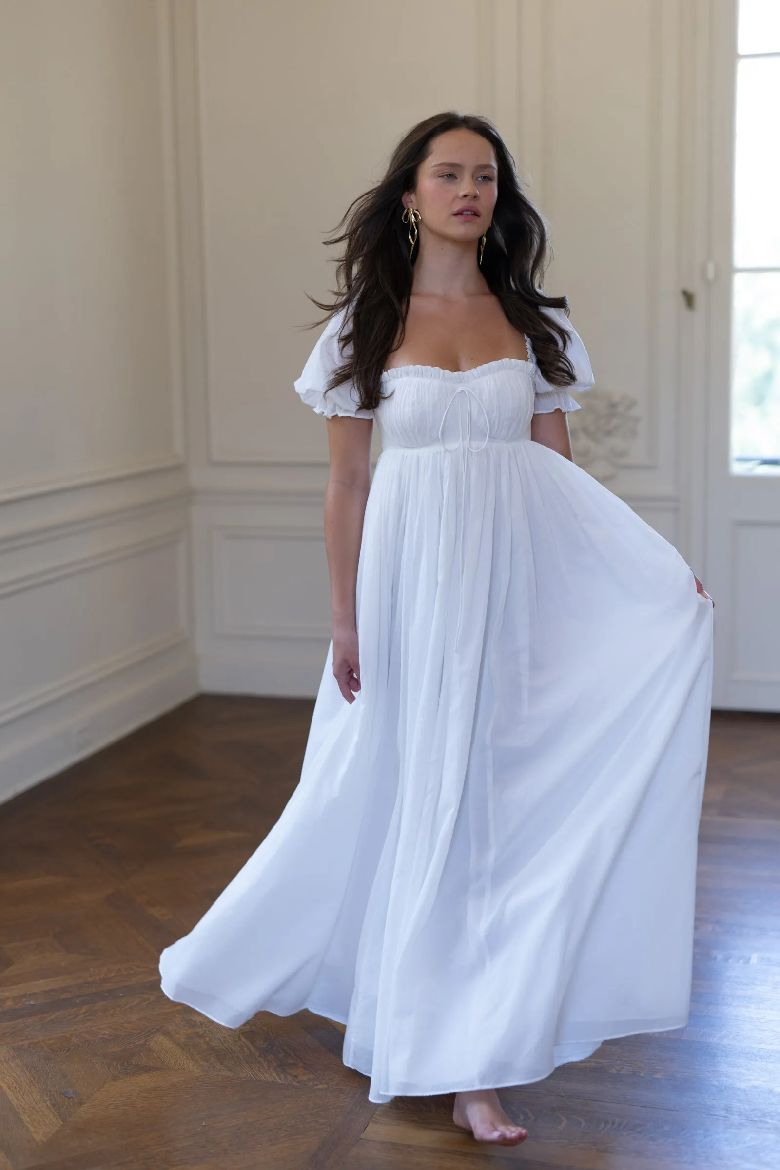 The Ivory Cotton Seashell Gown sold by Selkie